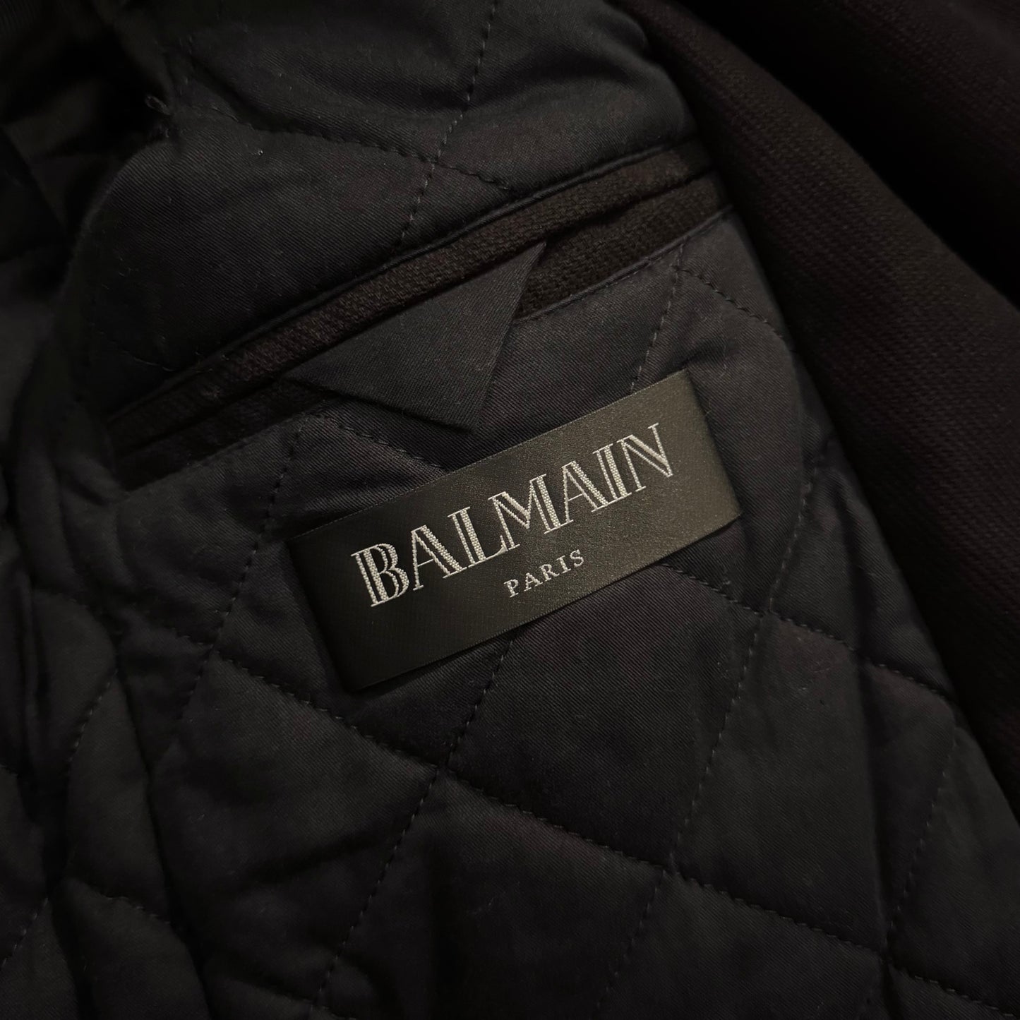 Balmain AW13 quilted raccoon trimmed bondage jacket