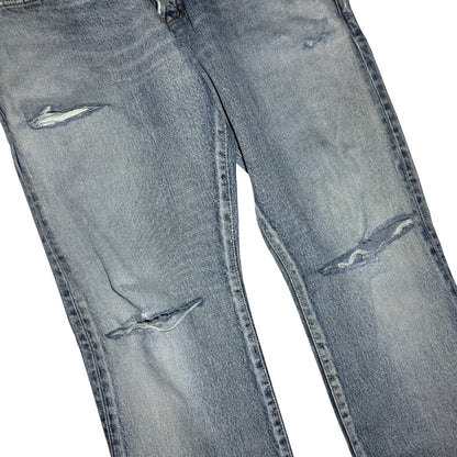 Saint Laurent D18 light wash slit-knee denim